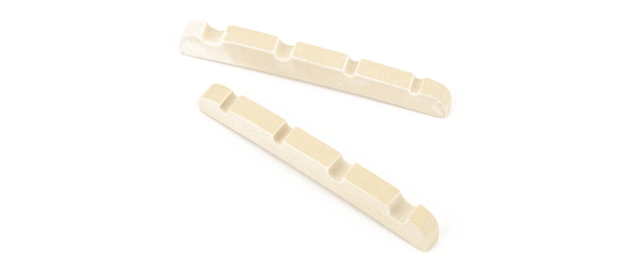 Нульовий поріжок FENDER JAZZ BASS PRE-SLOTTED MICARTA STRING NUT SET WHITE